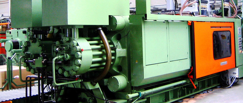 plastic mold system on large piece of equipment